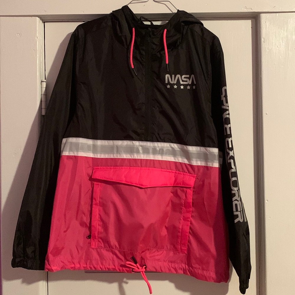 We have a nice Wind Breaker. Pretty pink black and white